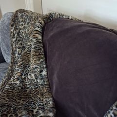 Large leopard skin fur throw and cushions
