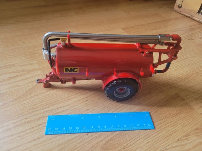 Toy farm shed, animals and machinery
