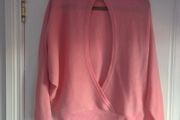 Pink long sleeve top cut back, size 10