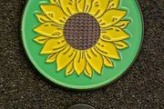 Sunflower,  pin back badge.