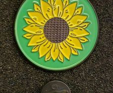 Sunflower,  pin back badge.