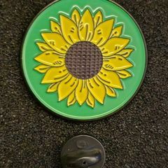 Sunflower,  pin back badge.