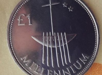 Millennium 1 pound coin in case