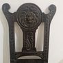 Carved oak antique chair with lion face motif Image 3