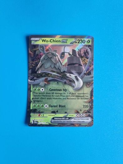 Wo-Chien Ex Pokemon Card from Paldea Evolved (027/193).