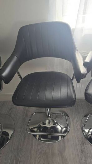 Adjustable black faux leather swivel bar stool with a metal base x3