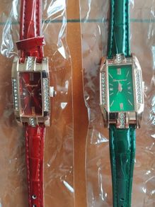 2 womans quartz watches with leather straps