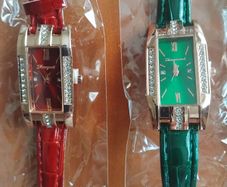 2 womans quartz watches with leather straps