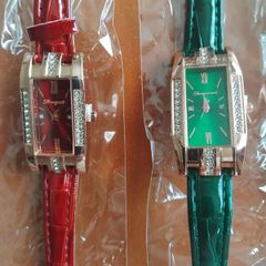 2 womans quartz watches with leather straps