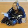 Vintage Figurine man reading book Image 3