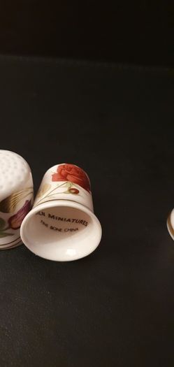 Collection of Flower Themed Gold Coloured Edged Thimbles