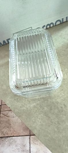 Vintage glass kraft square butter cheese dish lid glass Insert 15.00 euro.Vintage Pasabahce clear glass butter dish 24.00 euro, Fleur De Lis Cast Iron Door Stop Wedge Antique gold Black 4x3.5x7.75 Inch 34.00 euro , Vintage Englshe browne larg milk jug 18.