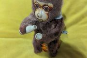 VINTAGE Wind Up Drinking Monkey Toy