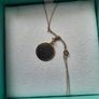 Gold disc and chain Image 6