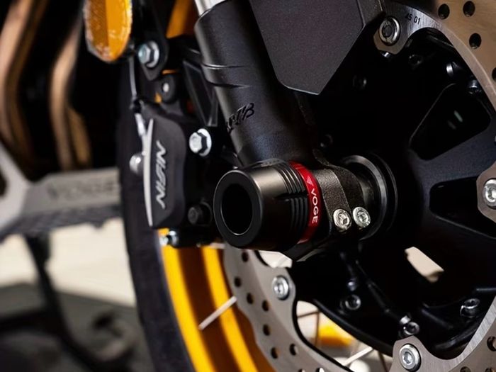 Front wheel axle slider crash protector.