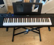 Yamaha Piaggero NP15 Portable Keyboard, Piano keys look, 61 Keys, USB connection, Black with Music stand and Heavy Duty keyboard Stand (Working Perfectly