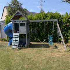 swing set with tub slide and climbing wall