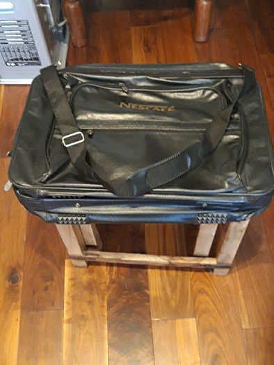Nescafe shoulder cross bag. Travelling bag with suit case.