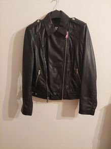 Brand New. Black Ladies Leather Jacket with zip & stud detail