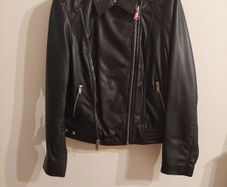 Brand New. Black Ladies Leather Jacket with zip & stud detail