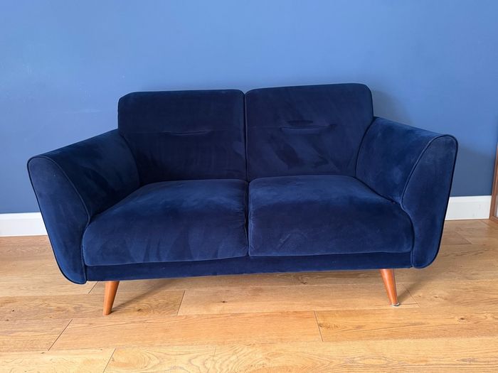 Navy velvet two seater sofa