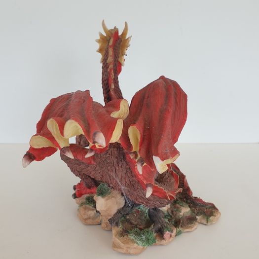 Red dragon figure on rock ceramic 19 cm high
