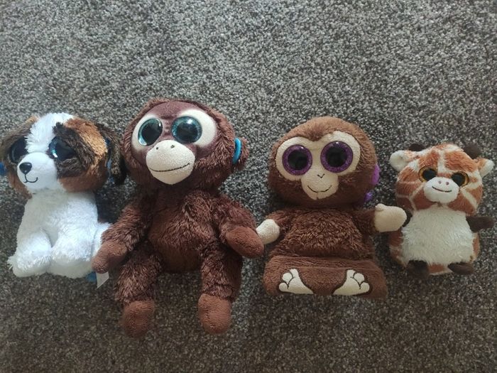 Bundle of 4 Ty Beanie Boos plush toys including the monkey phone holder stand