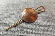 Vintage Irish Coin Brooch Pin Tie Slide attached to a brass crook design