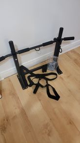 Pull up bar and boxing bag hanger