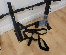Pull up bar and boxing bag hanger