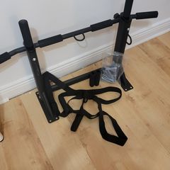 Pull up bar and boxing bag hanger