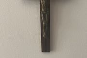 Bronze 1950s crufix on dark wood