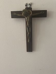 Bronze 1950s crufix on dark wood