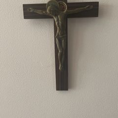 Bronze 1950s crufix on dark wood