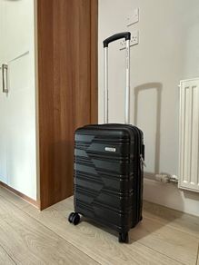 American Tourister carry-on. Black. Like new.