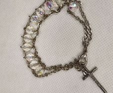 Crystal bracelet with cross charm