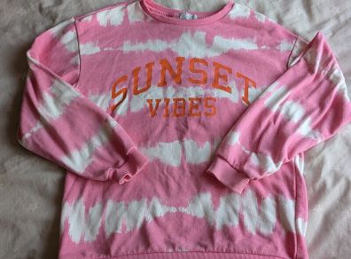 Pink jumper age 12-13