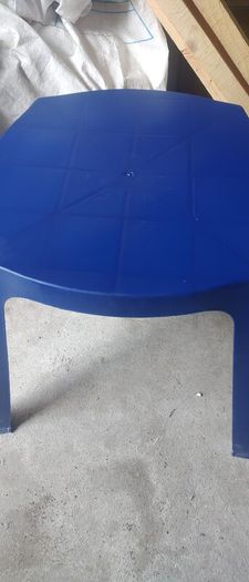 Blue plastic table . please read description