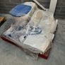 Toilet with handrails, two sinks, unused. Image 3