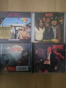 AC / DC.  Collection of 4 albums: Dirty Deeds Done Dirt Cheap / Highway To Hell / Let There To Be Rock / If You Want Blood.