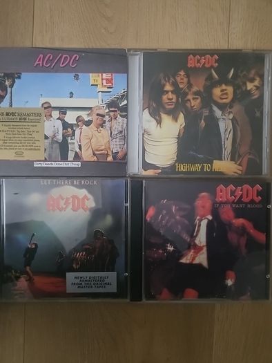AC / DC.  Collection of 4 albums: Dirty Deeds Done Dirt Cheap / Highway To Hell / Let There To Be Rock / If You Want Blood.