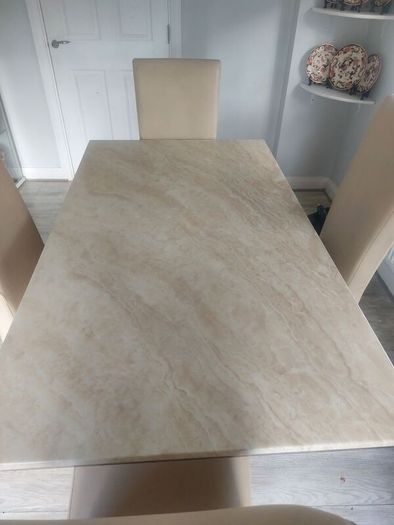 cream marble table and 4 chairs