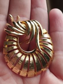 Vintage gold tone brooch.
