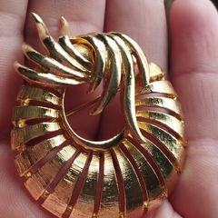 Vintage gold tone brooch.