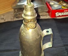 Antique French Lampe-Briquet lighter lamp manufactured by the brand TH. It is described as Sans Soudure The inscription Inexplosible indicates it was marketed as a safety product, often dating from before 1900s