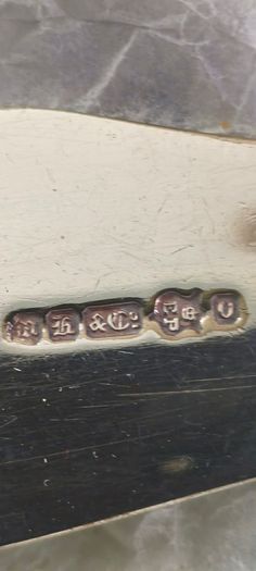 Silver-plated utensil fish carving set or serving set, noted by the specific shape of the knife blade.