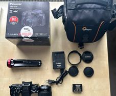 Panasonic Lumix G7 (Open Box) + 12-60 lens + Camera Bag + Stand and more