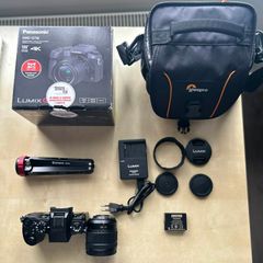 Panasonic Lumix G7 (Open Box) + 12-60 lens + Camera Bag + Stand and more