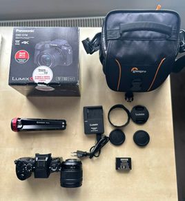 Panasonic Lumix G7 (Open Box) + 12-60 lens + Camera Bag + Stand and more