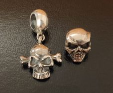 2 silver tone charms skull & skull bones
